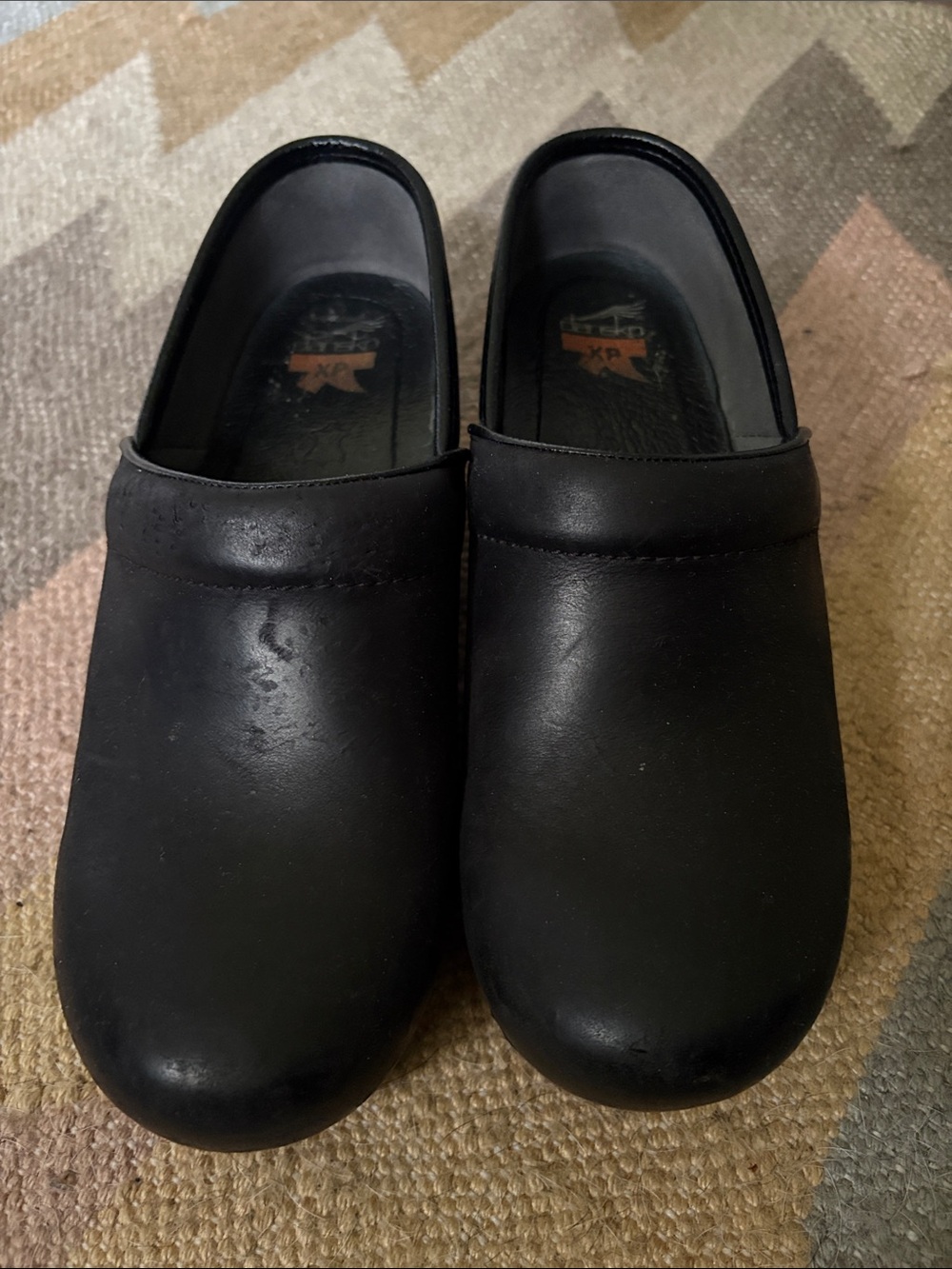 Dansko Black Slip-On Clogs